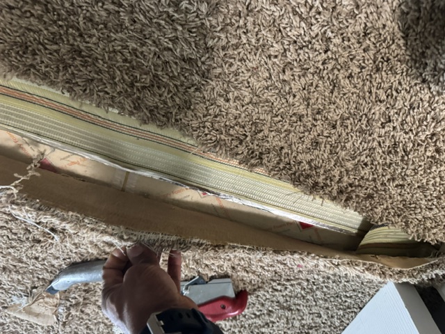 YesSir Services Carpet Repair - Opening the Damaged Seam