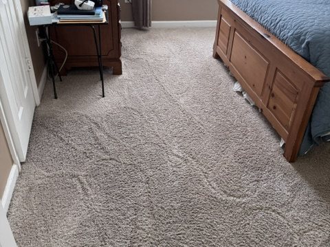 Before stretching showing the loose carpet condition