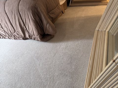 After deep carpet cleaning showing the completed room area